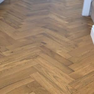 Engineered herringbone golden oak close up