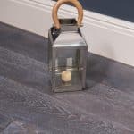 Black with white grain flooring close up
