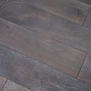 Black with white grain flooring close up